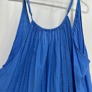Swim suit cover up. Bright blue like the ocean water. Super light weight.